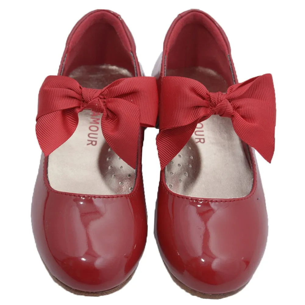 Dressy patent shoes with grosgrain bow