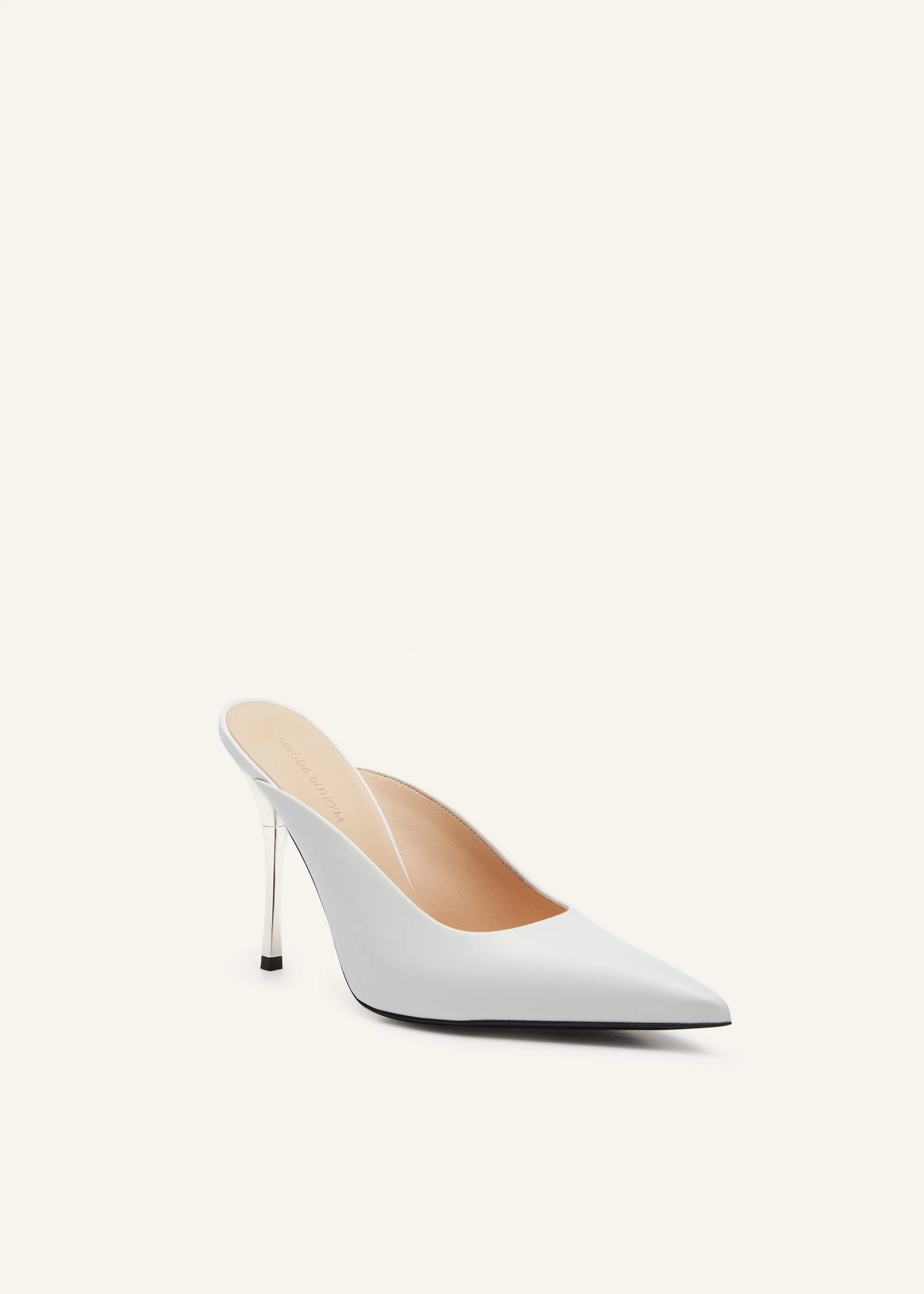 Pointed-toe mules in white leather